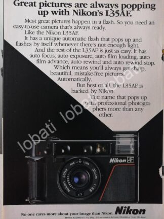 CARTEL ANTIGUO ORIGINAL DE CAMARAS FOTOGRAFICAS NIKON L35AF 1980s /503